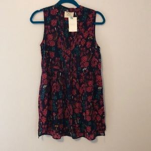 Silk sleeveless button down blouse